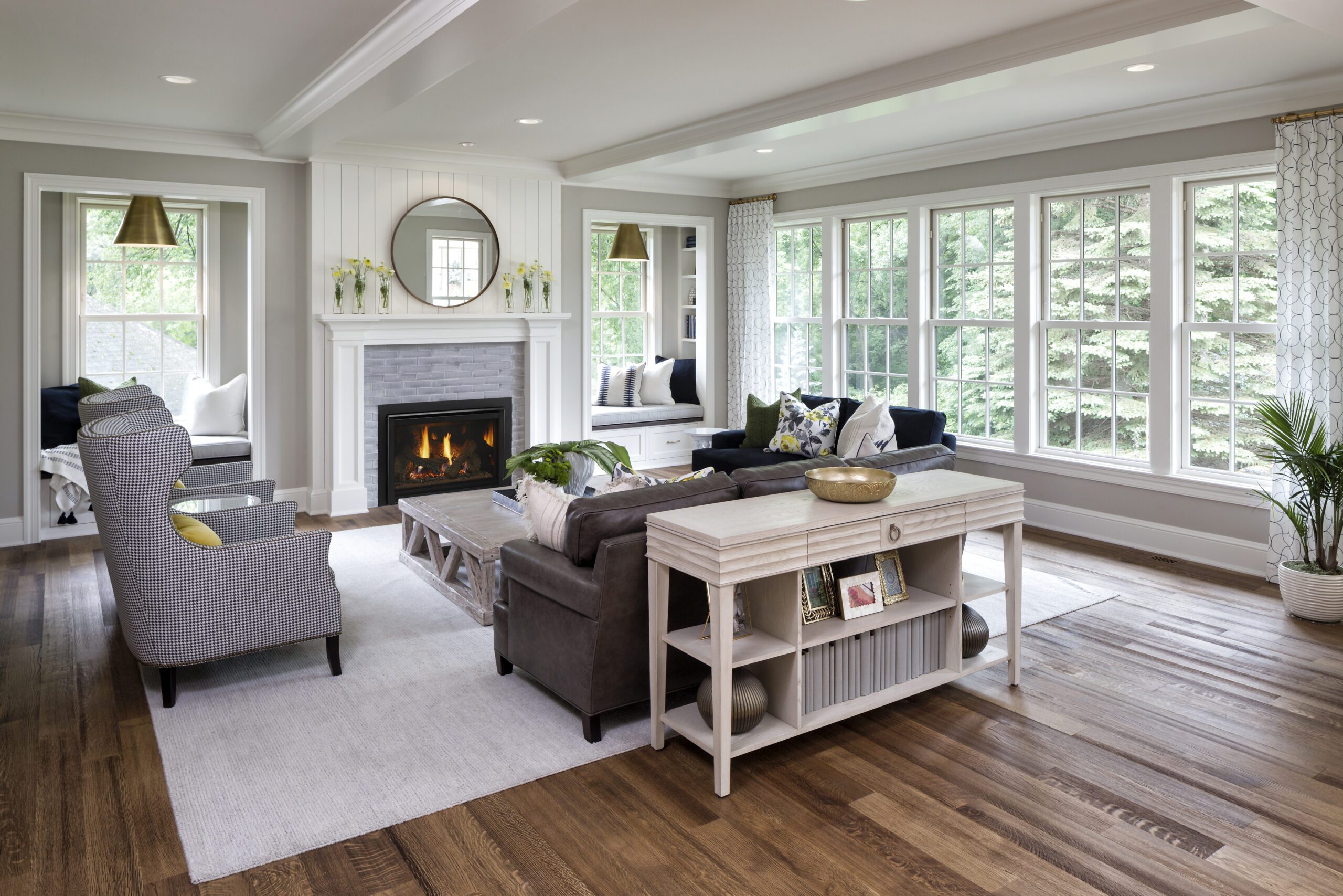 Neutral toned living room with a grey brick fireplace